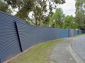 South Australian sculptor Marijana Tadic created a continuous feature wall around Gawler Caravan Park using COLORBOND® steel, both vertically and horizontally, in alternate colours of Mountain Blue and Torres Blue.