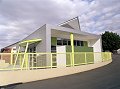 New Town Primary School's new General Purpose Hall uses steel and large glass facades to create a dynamic, eye-catching finish. The feature of the hall is a cantilevered flying roof and wall cladding made from ZINCALUME® steel.