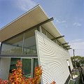 The home office of Victorian architect Peter Woolard used COLORBOND® steel on the roof, ceiling, eaves and a feature blade wall to create a striking split-level townhouse on a small and narrow site in a heritage precinct of Geelong.