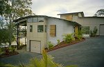 Style-Line Building has received the Queensland Housing Industry Association's Most Innovative Use of Steel award for its latest home where curved roofing made from COLORBOND® steel and a curved wall finished externally in ZINCALUME® steel are dominant features.